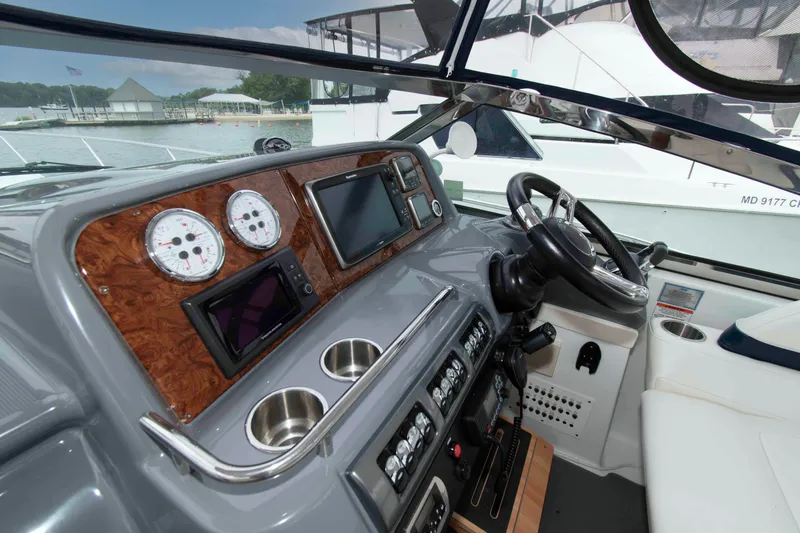 Slide: The Image of Cockpit of 2014 Formula 40 Performance Cruiser with modern navigation instruments and steering wheel. - 8