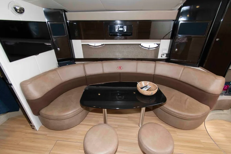Slide: The Image of Luxurious interior of 2014 Formula 40 Performance Cruiser with curved seating and modern decor. - 15