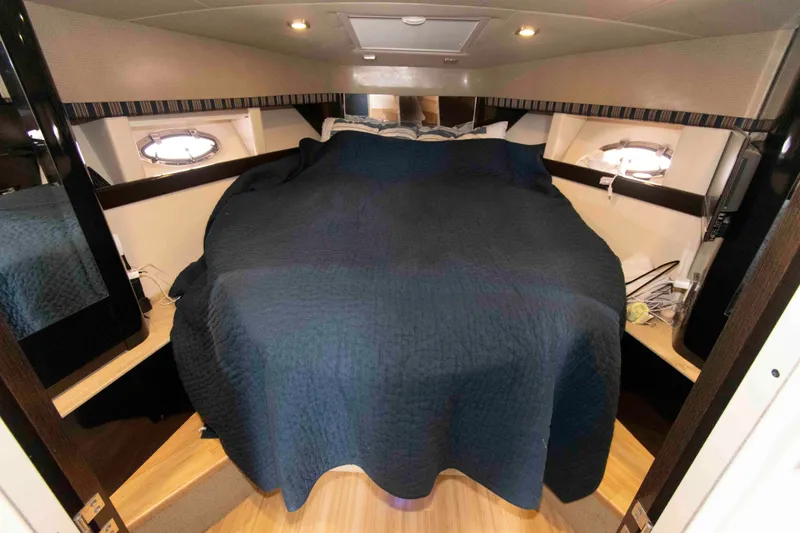 Slide: The Image of Interior cabin of 2014 Formula 40 Performance Cruiser with cozy bed and porthole windows. - 17