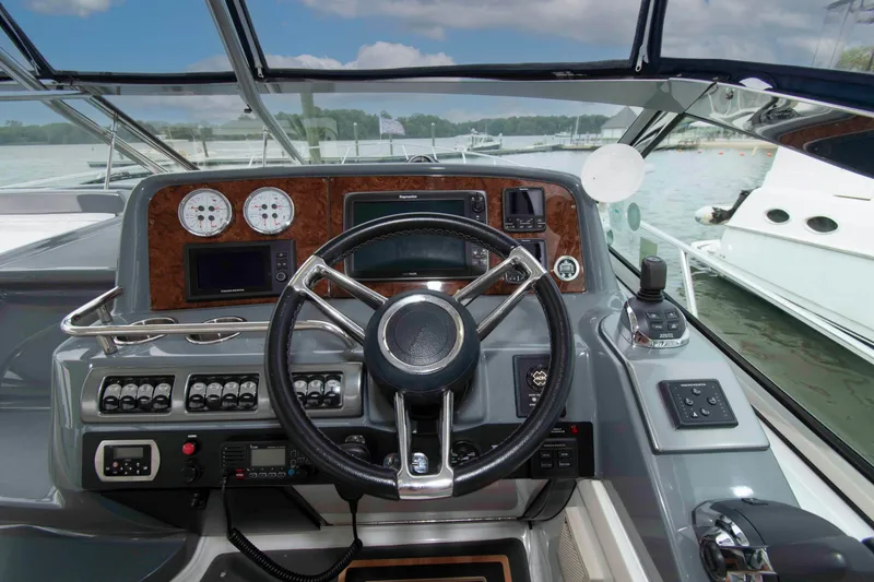 Slide: The Image of Cockpit of 2014 Formula 40 Performance Cruiser with advanced navigation controls and gauges. - 9