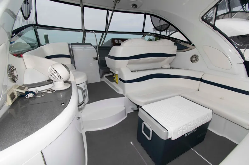 Slide: The Image of 2014 Formula 40 Performance Cruiser interior with white seating and modern amenities. - 5