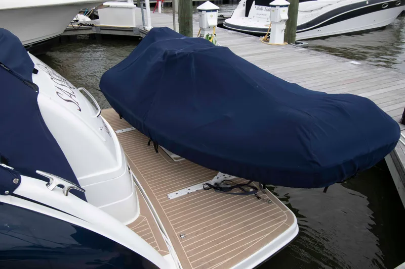 Slide: The Image of 2014 Formula 40 Performance Cruiser with covered equipment on docked platform. - 4