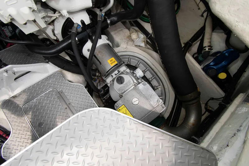 Slide: The Image of Engine compartment of a 2014 Formula 40 Performance Cruiser, showcasing mechanical components. - 25
