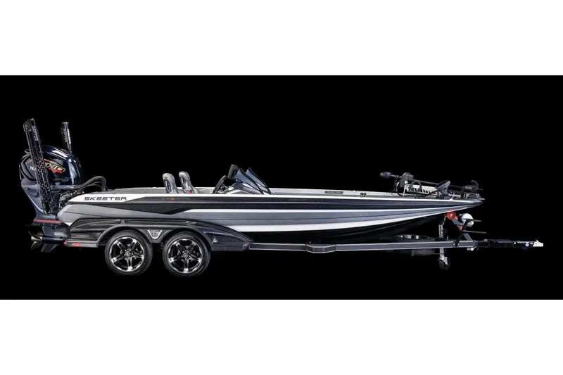 Slide: The Image of Manufacturer Provided Image: 2022 Skeeter FXR 21 bass boat on trailer, side view. - 19