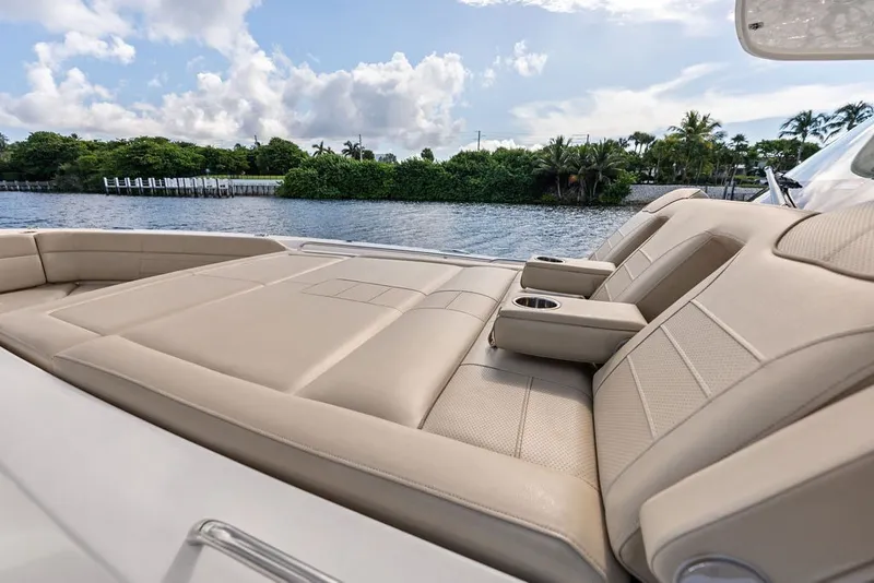 Slide: The Image of Luxurious seating on 2020 Pursuit S 408 Sport boat with scenic water view. - 41