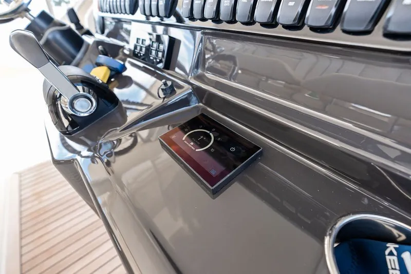 Slide: The Image of Control panel of 2020 Pursuit S 408 Sport boat with throttle and touchscreen display. - 31
