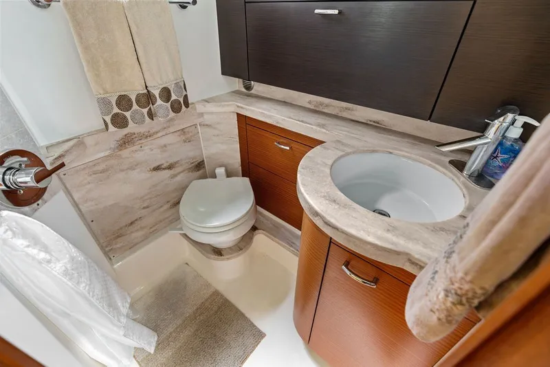 Slide: The Image of Luxurious bathroom in 2020 Pursuit S 408 Sport boat with modern fixtures and elegant design. - 55