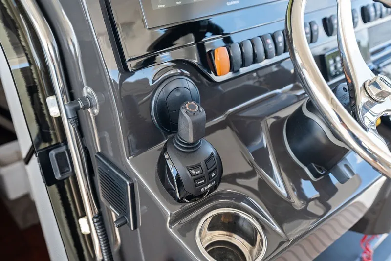 Slide: The Image of Control panel of 2020 Pursuit S 408 Sport boat with steering wheel and joystick. - 34