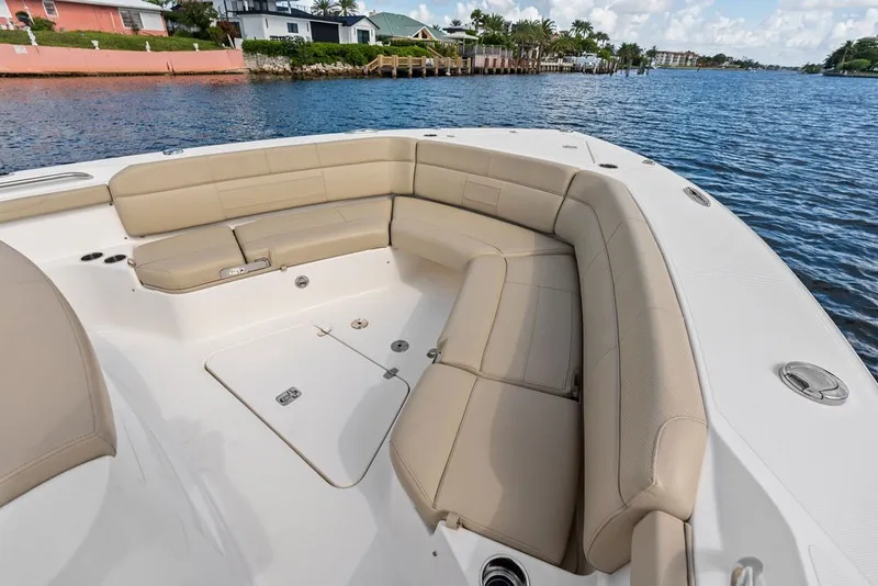 Slide: The Image of 2020 Pursuit S 408 Sport boat with spacious seating on calm waters. - 42