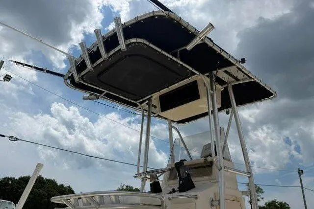 Slide: The Image of 2006 Parker 2100 Special Edition boat with T-top under cloudy sky. - 7