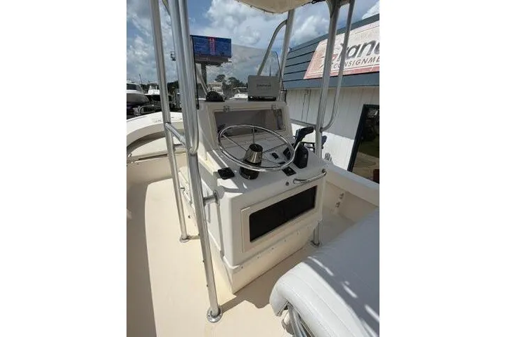 Slide: The Image of 2006 Parker 2100 Special Edition boat console with steering wheel and controls. - 21