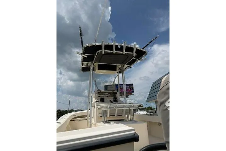 Slide: The Image of 2006 Parker 2100 Special Edition boat with T-top under cloudy sky. - 3