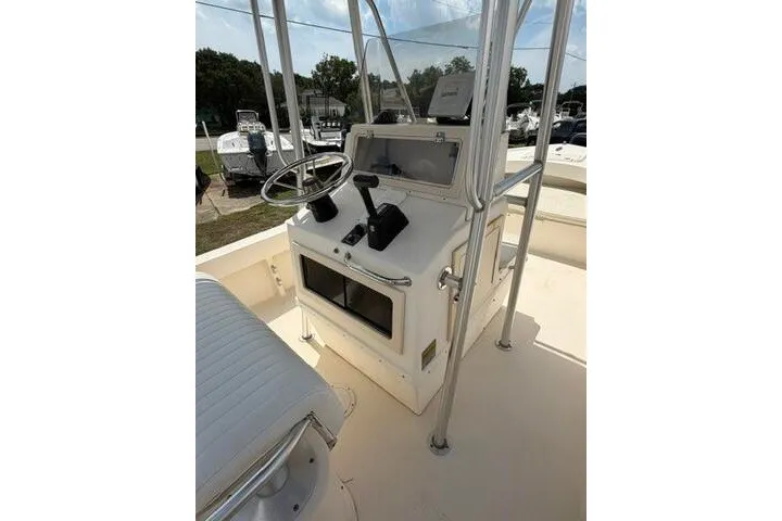 Slide: The Image of 2006 Parker 2100 Special Edition boat console with steering wheel and controls. - 18