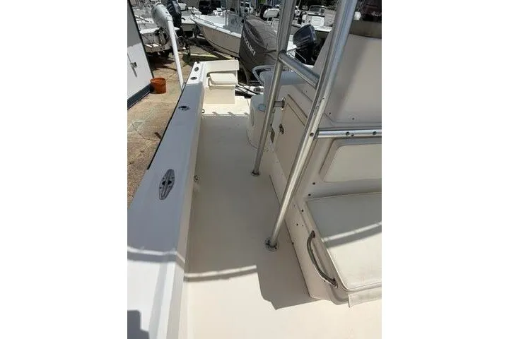 Slide: The Image of 2006 Parker 2100 Special Edition boat deck with seating and storage compartments. - 13