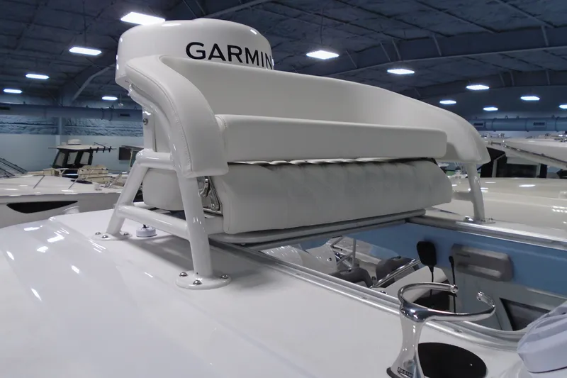 Slide: The Image of 2027 Striking Boats 27XB with Garmin radar, showcased indoors. - 30