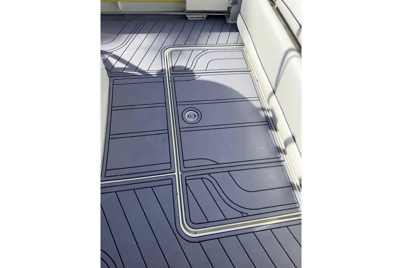 Slide: The Image of 2005 Hydra-Sports Vector 3300 VX boat deck with sleek, modern design and durable flooring. - 6