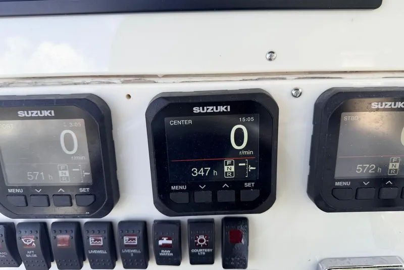 Slide: The Image of Dashboard of a 2005 Hydra-Sports Vector 3300 VX with Suzuki engine displays. - 4