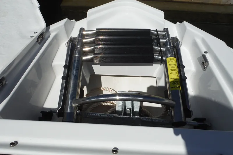 Slide: The Image of 2024 Monterey 255SS Super Sport boat ladder and storage compartment detail. - 38
