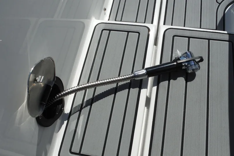 Slide: The Image of 2024 Monterey 255SS Super Sport deck with a flexible shower hose. - 36