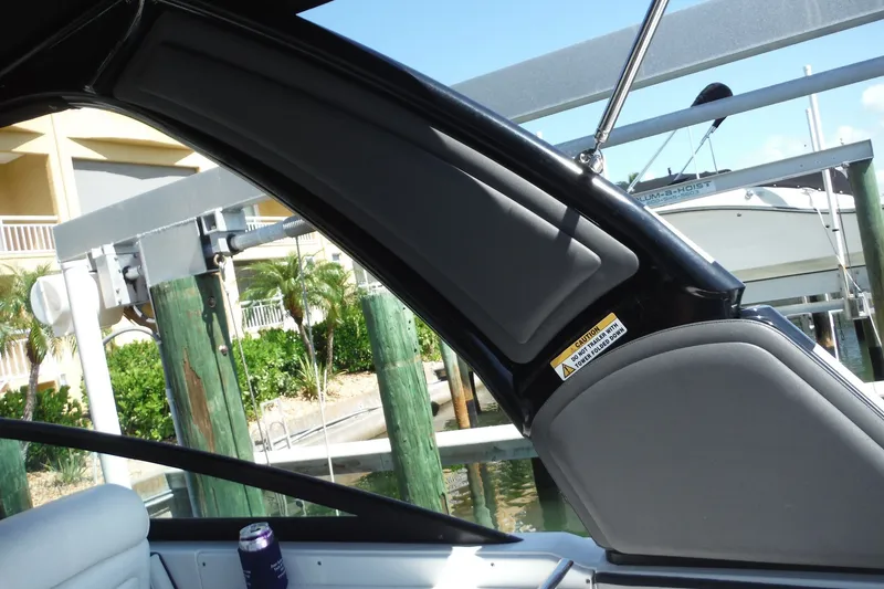 Slide: The Image of 2024 Monterey 255SS Super Sport boat interior with sleek design and caution label. - 35