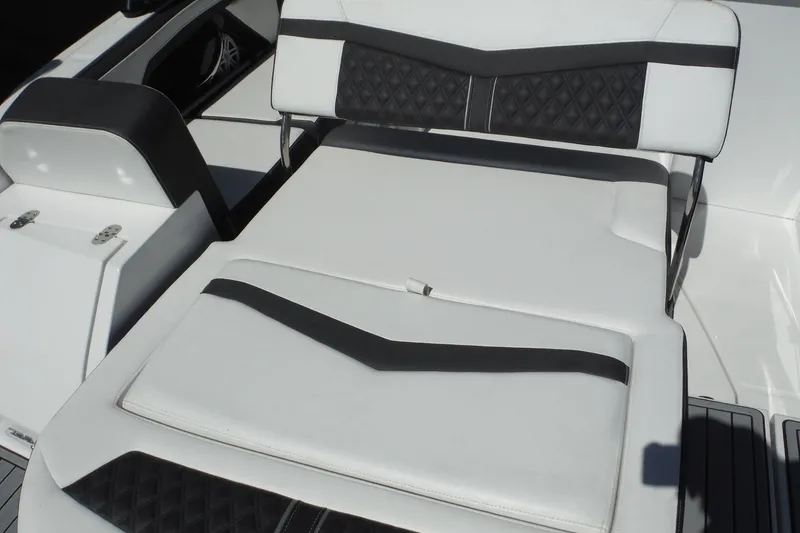 Slide: The Image of 2024 Monterey 255SS Super Sport boat interior with sleek white and black seating. - 18