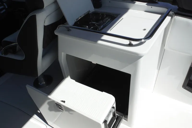 Slide: The Image of 2024 Monterey 255SS Super Sport boat interior with seating and storage area. - 16