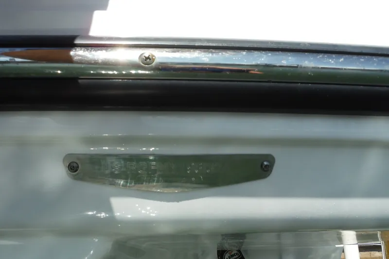 Slide: The Image of 2024 Monterey 255SS Super Sport boat detail with metal plate and screws. - 27
