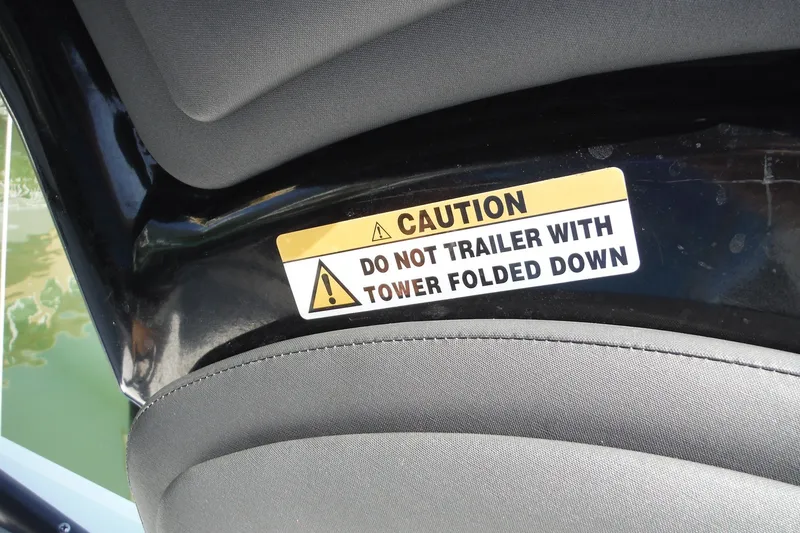 Slide: The Image of Caution label on 2024 Monterey 255SS Super Sport boat interior. - 34