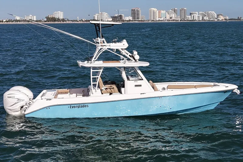 The Image of 2020 Everglades 365 Center Console boat on ocean with city skyline background. - 1