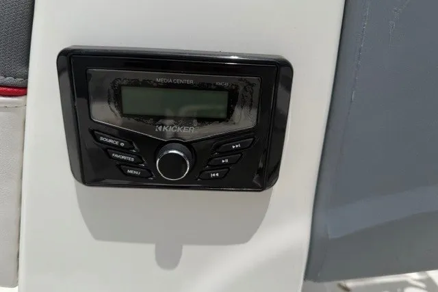 Slide: The Image of Kicker media center in 2021 Tahoe T16 boat dashboard. - 10