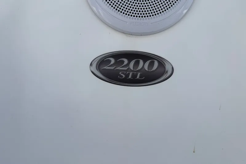 Slide: The Image of 2016 Blue Wave 2200 STL emblem with speaker detail. - 14