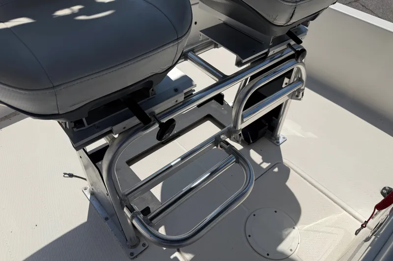 Slide: The Image of 2016 Blue Wave 2200 STL boat seating with stainless steel frame and cushioned seats. - 21