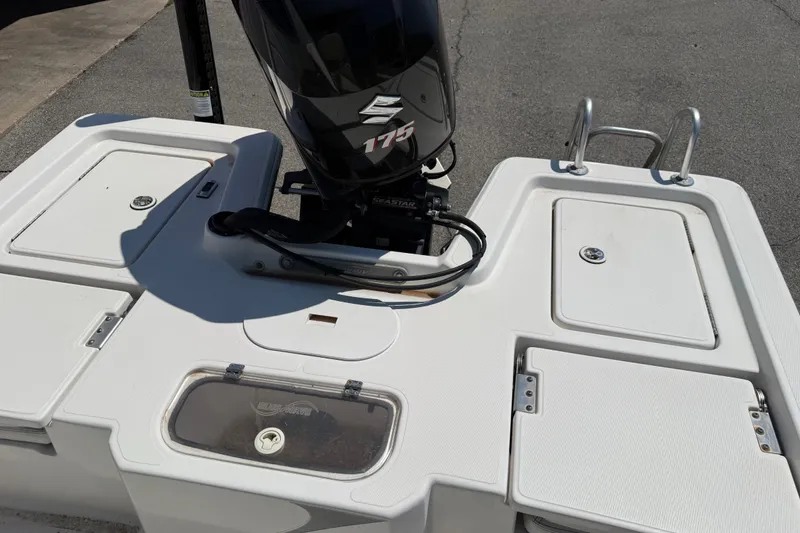 Slide: The Image of 2016 Blue Wave 2200 STL boat with Suzuki 175 engine, rear deck view. - 31