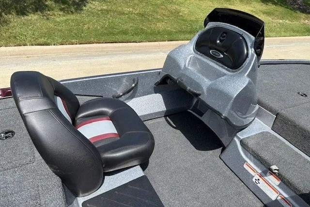 Slide: The Image of 2027 Nitro Z17 boat interior with black and red seating and control console. - 35