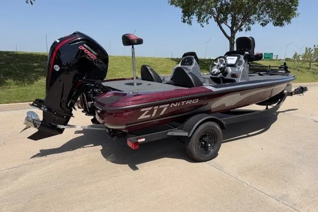 Slide: The Image of 2027 Nitro Z17 boat with powerful outboard motor on a trailer. - 22