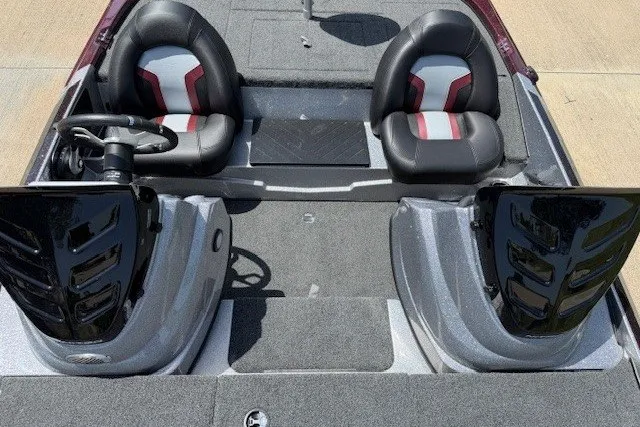 Slide: The Image of 2027 Nitro Z17 boat interior with dual seats and steering wheel, featuring sleek design. - 31