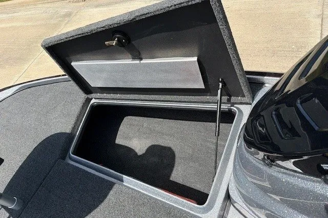 Slide: The Image of Open storage compartment on a 2027 Nitro Z17 boat deck. - 27