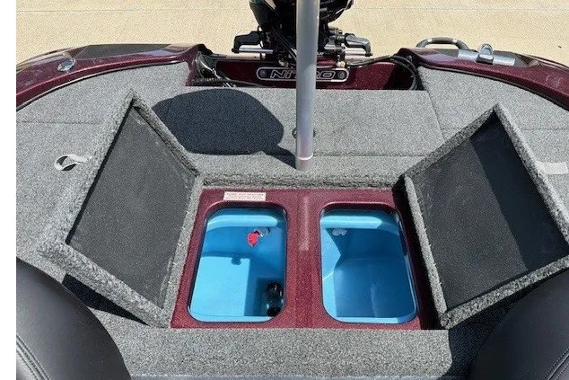 Slide: The Image of Open storage compartments on a 2027 Nitro Z17 boat deck. - 29