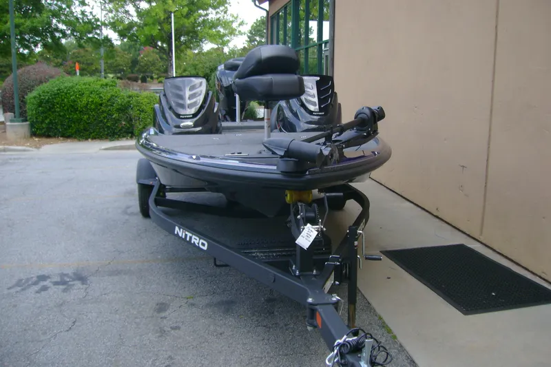 Slide: The Image of 2027 Nitro Z17 boat on trailer, parked outdoors near building. - 6