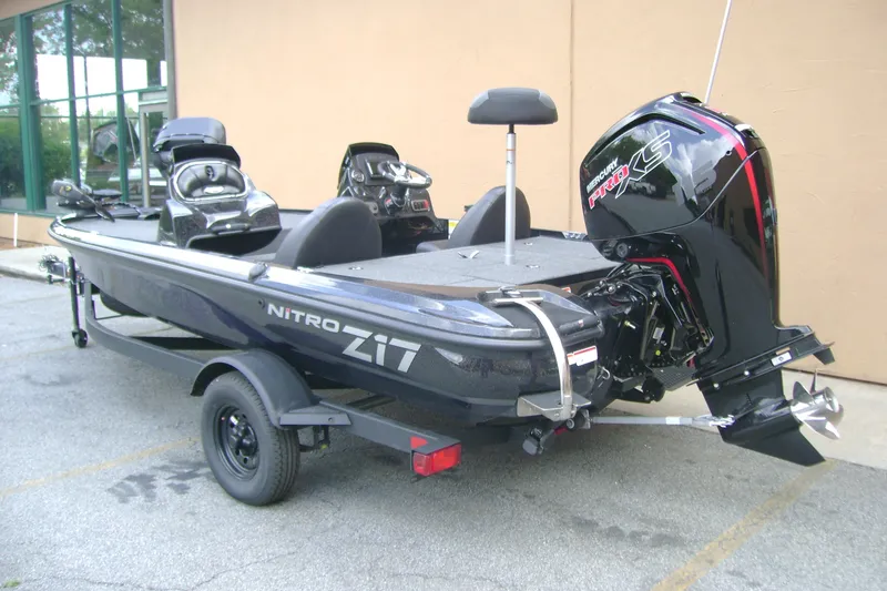 Slide: The Image of 2027 Nitro Z17 boat with Mercury Pro XS engine, parked on a trailer. - 5