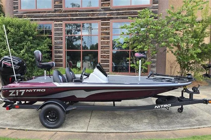Slide: The Image of 2027 Nitro Z17 boat parked outdoors, featuring sleek design and modern features. - 4
