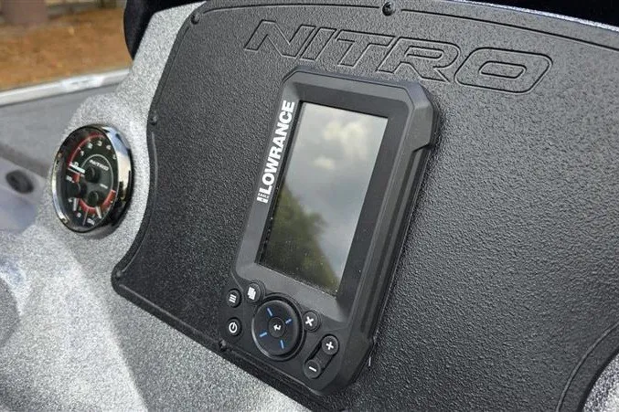 Slide: The Image of Dashboard of a 2027 Nitro Z17 boat featuring a Lowrance fishfinder and gauge. - 8