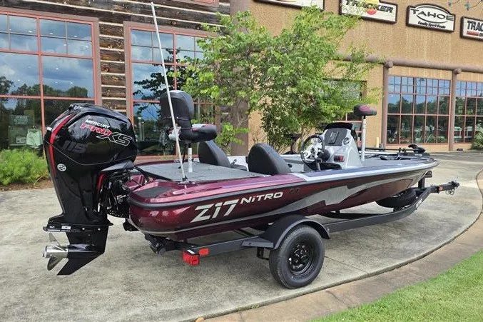 Slide: The Image of 2027 Nitro Z17 boat with Mercury Pro XS engine, parked outdoors. - 3