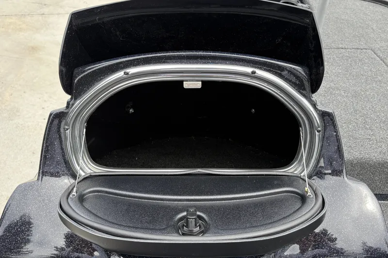 Slide: The Image of Open storage compartment of a 2027 Nitro Z17 boat, showcasing interior space. - 21