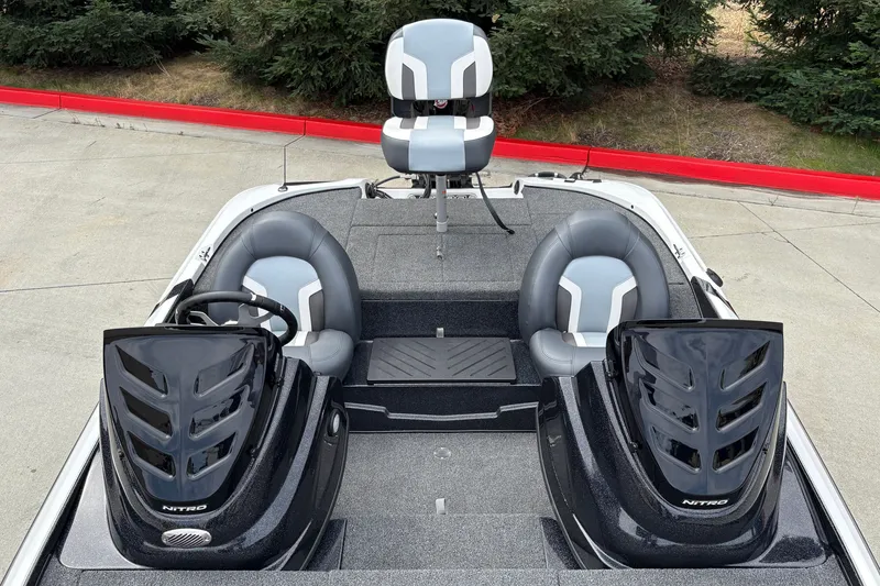 Slide: The Image of 2027 Nitro Z17 boat interior with dual seats and steering console. - 14