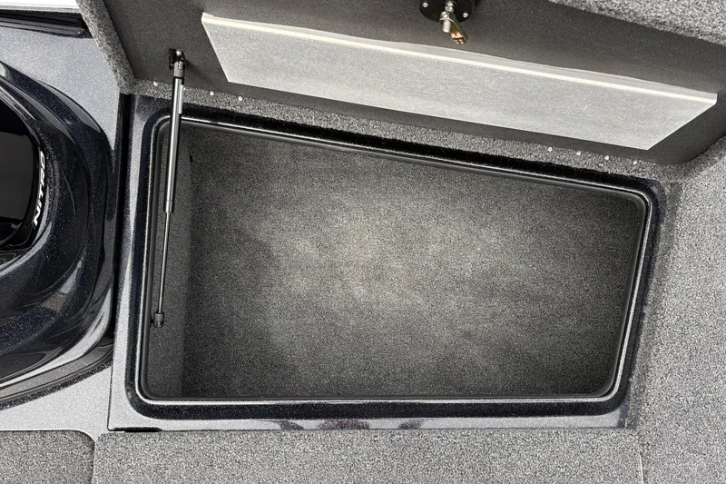 Slide: The Image of Open storage compartment in a 2027 Nitro Z17 boat. - 35