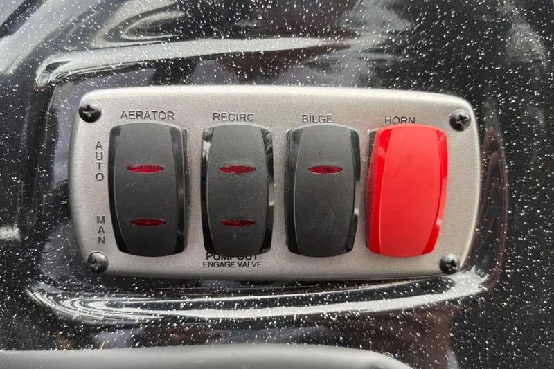 Slide: The Image of Control panel of Nitro Z17 2027 boat with switches for aerator, recirculation, bilge, and horn. - 20
