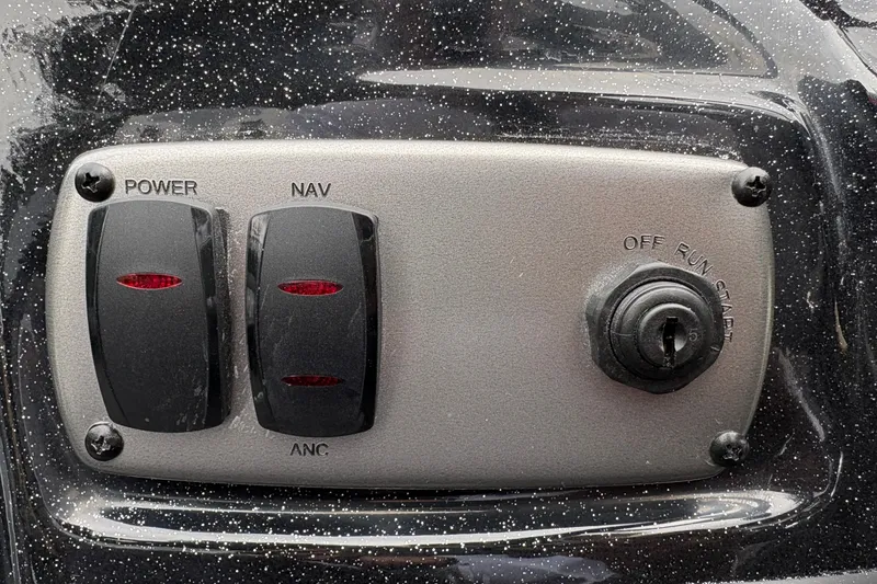 Slide: The Image of Control panel of a 2027 Nitro Z17 boat with power and navigation switches. - 23