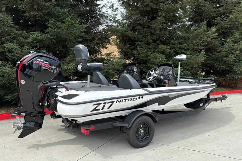 Slide: The Image of 2027 Nitro Z17 boat with Mercury Pro XS engine, parked on a trailer. - 4
