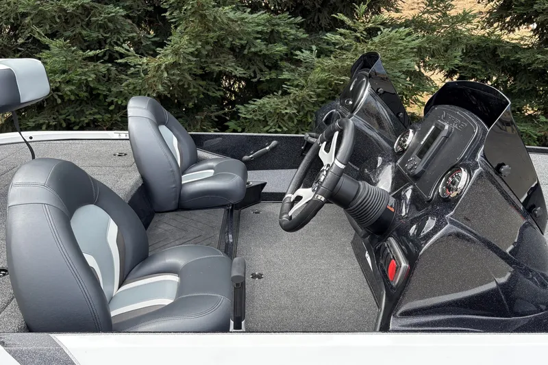 Slide: The Image of Interior of a 2027 Nitro Z17 boat with dual seats and steering console. - 19